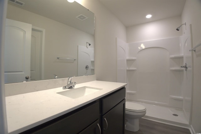 205 Kc Ln, Aynor, SC 29511 - full bath with vanity, wood finished floors, a shower, and recessed lighting