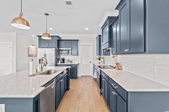 304 29th Ave N, North Myrtle Beach, SC 29582 - kitchen featuring stainless steel appliances, recessed lighting, ornamental molding, light wood-type flooring, and decorative backsplash