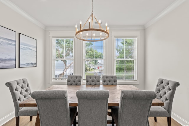 304 29th Ave N, North Myrtle Beach, SC 29582 - dining space featuring a chandelier, healthy amount of natural light, wood finished floors, and crown molding