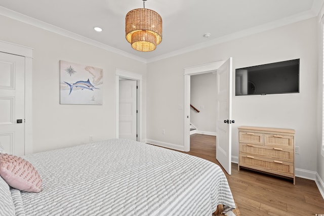 304 29th Ave N, North Myrtle Beach, SC 29582 - bedroom featuring crown molding, wood finished floors, and recessed lighting