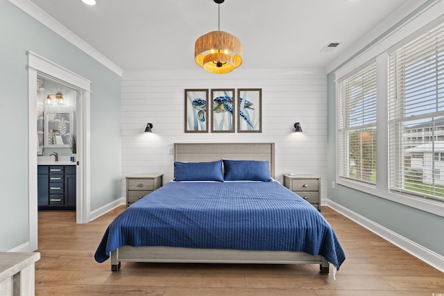 304 29th Ave N, North Myrtle Beach, SC 29582 - bedroom with wood finished floors, recessed lighting, crown molding, and wooden walls