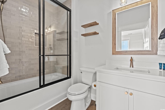 304 29th Ave N, North Myrtle Beach, SC 29582 - full bath with shower / bath combination with glass door, vanity, and wood finished floors