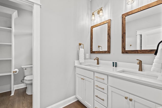 304 29th Ave N, North Myrtle Beach, SC 29582 - bathroom featuring double vanity and wood finished floors