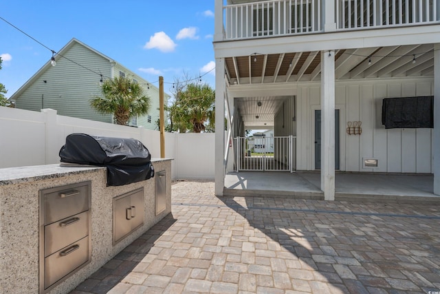 304 29th Ave N, North Myrtle Beach, SC 29582 - patio / terrace featuring an outdoor kitchen and a patio