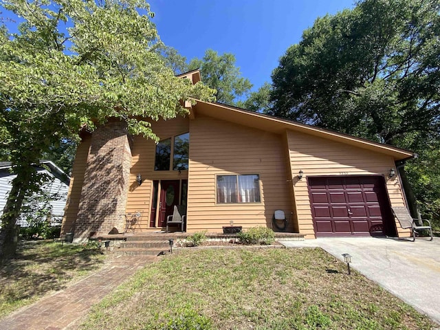 2232 Franklin Cir, Little River, SC 29566 - mid-century home with driveway and a garage