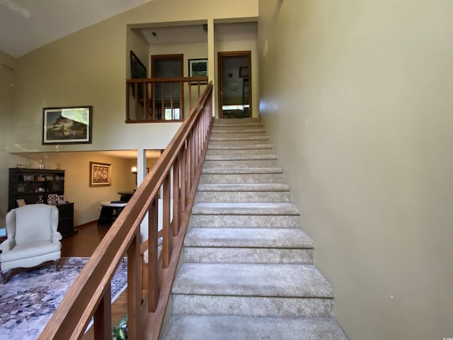 2232 Franklin Cir, Little River, SC 29566 - staircase featuring vaulted ceiling