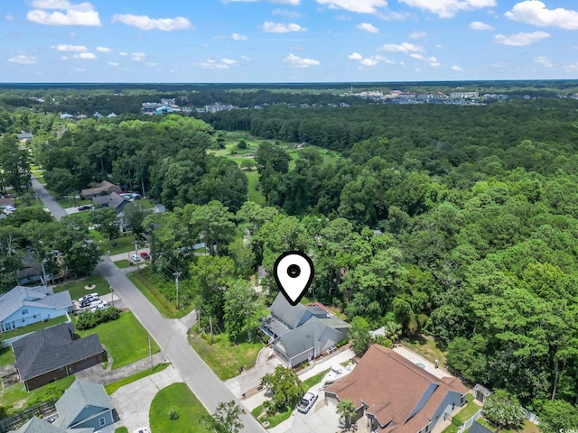 1504 27th Ave N, North Myrtle Beach, SC 29582 - aerial overview of property's location with a heavily wooded area