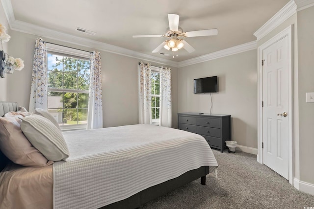 1504 27th Ave N, North Myrtle Beach, SC 29582 - bedroom featuring crown molding, multiple windows, carpet floors, and a ceiling fan