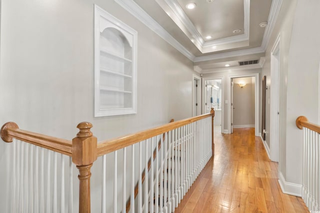 1504 27th Ave N, North Myrtle Beach, SC 29582 - hall featuring an upstairs landing, light wood-type flooring, recessed lighting, and ornamental molding