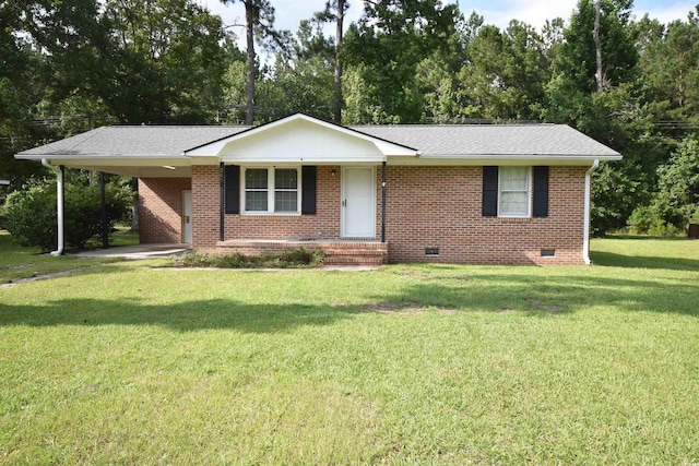 240 Yadkin Ave, Georgetown, SC 29440 - ranch-style house with crawl space, an attached carport, a porch, a front yard, and brick siding