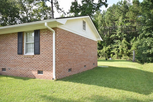 240 Yadkin Ave, Georgetown, SC 29440 - view of side of property with crawl space, a yard, and brick siding