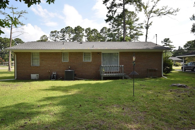 240 Yadkin Ave, Georgetown, SC 29440 - back of house featuring a yard, brick siding, and crawl space