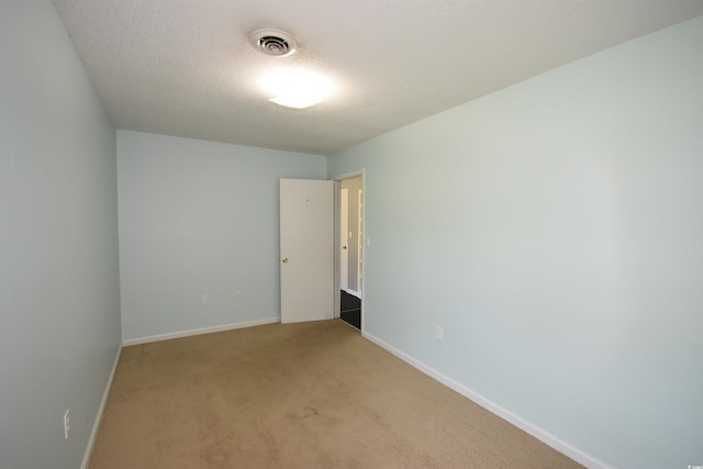 240 Yadkin Ave, Georgetown, SC 29440 - unfurnished room featuring light carpet and a textured ceiling