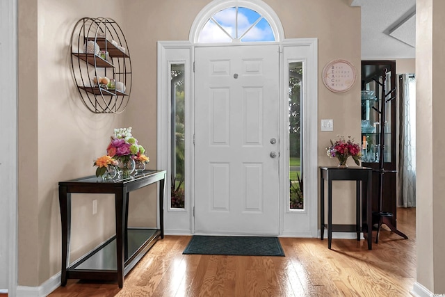 3922 Glenmere Dr, Myrtle Beach, SC 29588 - foyer entrance featuring wood finished floors and baseboards