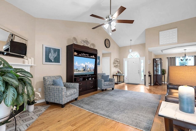 3922 Glenmere Dr, Myrtle Beach, SC 29588 - living area featuring wood finished floors, ceiling fan, a chandelier, and high vaulted ceiling