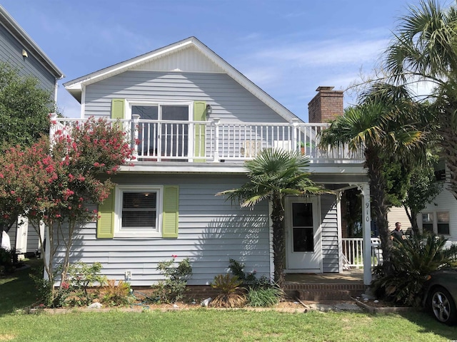 910 Perrin Dr, North Myrtle Beach, SC 29582 - view of front of house with a balcony