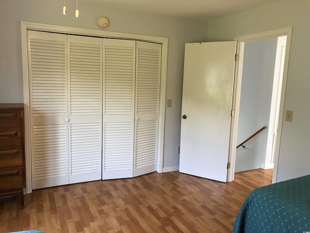 910 Perrin Dr, North Myrtle Beach, SC 29582 - bedroom with a closet and wood finished floors