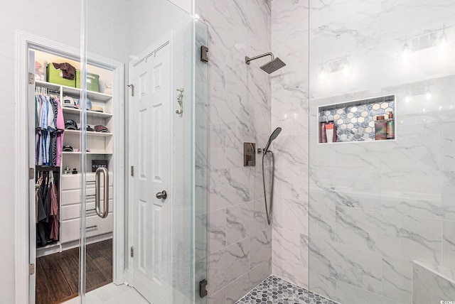 6014 Catalina Dr Unit 413, North Myrtle Beach, SC 29582 - bathroom with a marble finish shower and a spacious closet