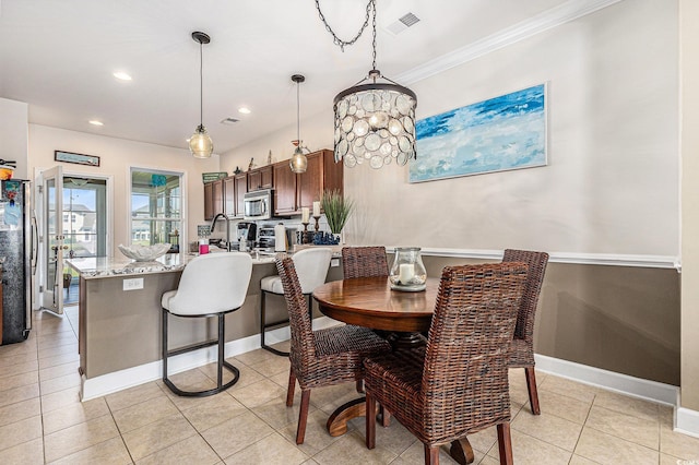 6014 Catalina Dr Unit 413, North Myrtle Beach, SC 29582 - dining area with light tile patterned floors, recessed lighting, and ornamental molding