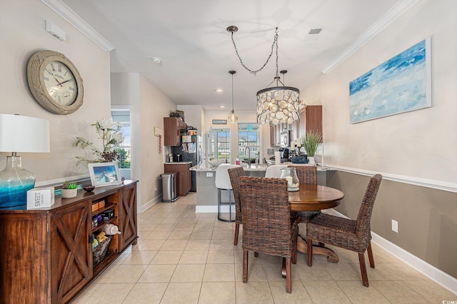 6014 Catalina Dr Unit 413, North Myrtle Beach, SC 29582 - dining area featuring crown molding and light tile patterned floors