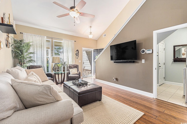 6014 Catalina Dr Unit 413, North Myrtle Beach, SC 29582 - living room featuring ceiling fan, light wood finished floors, and vaulted ceiling