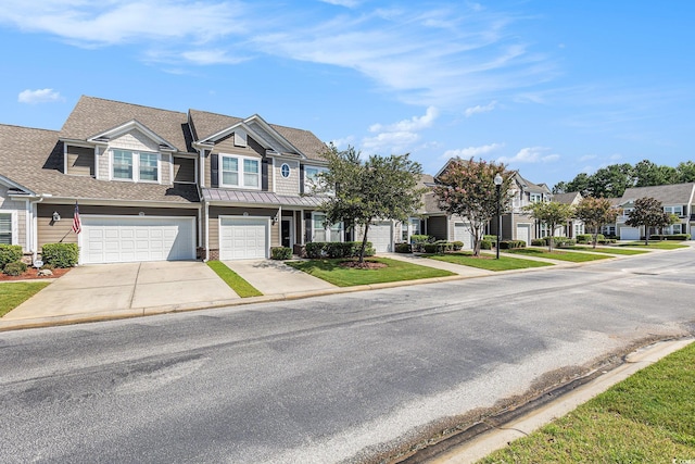 6014 Catalina Dr Unit 413, North Myrtle Beach, SC 29582 - view of front facade with concrete driveway, a residential view, a garage, and a shingled roof