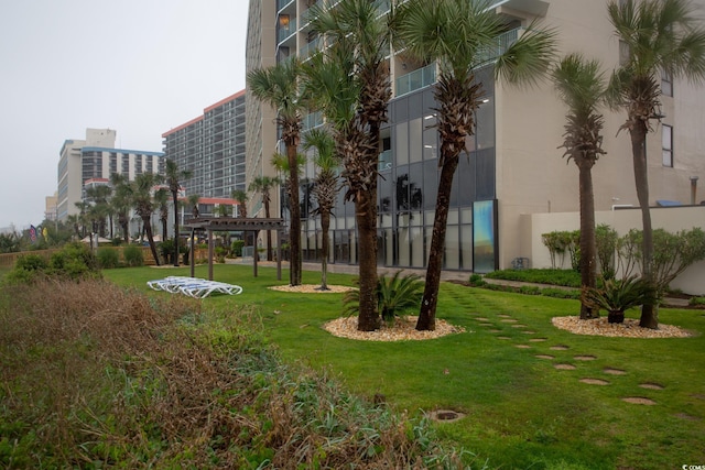 201 74th Ave N Unit 1401, Myrtle Beach, SC 29572 - surrounding community featuring a lawn