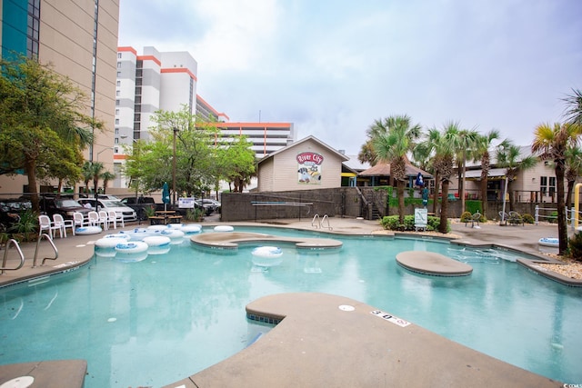 201 74th Ave N Unit 1401, Myrtle Beach, SC 29572 - community pool featuring a patio