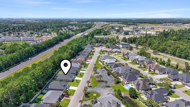 293 Waterfall Cir, Little River, SC 29566 - aerial overview of property's location featuring nearby suburban area and a tree filled landscape