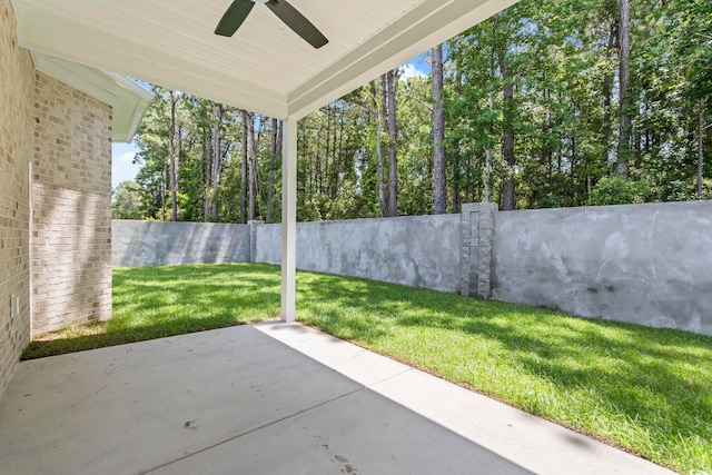 293 Waterfall Cir, Little River, SC 29566 - fenced backyard featuring a ceiling fan and a patio area