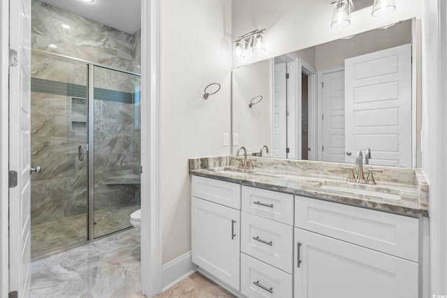 293 Waterfall Cir, Little River, SC 29566 - full bath featuring double vanity, marble finish flooring, and a marble finish shower