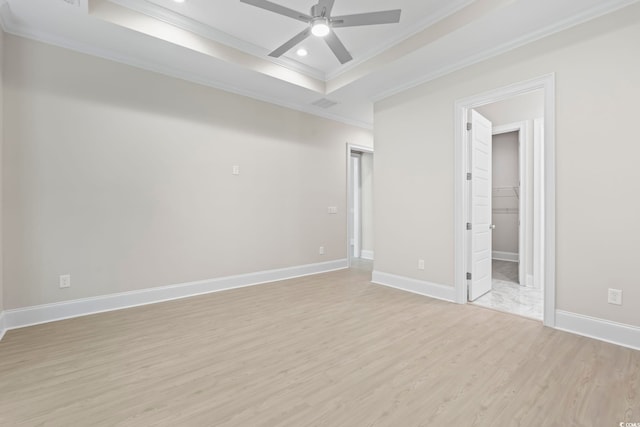 293 Waterfall Cir, Little River, SC 29566 - empty room with crown molding, light wood-style floors, a raised ceiling, ceiling fan, and recessed lighting