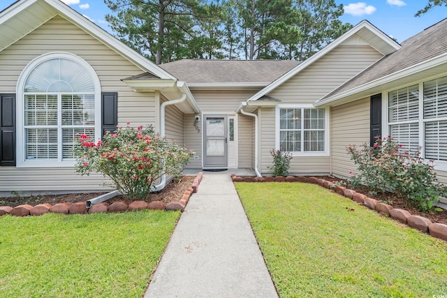 603 Bucks Trl, Longs, SC 29568 - view of front of house with a shingled roof and a front lawn