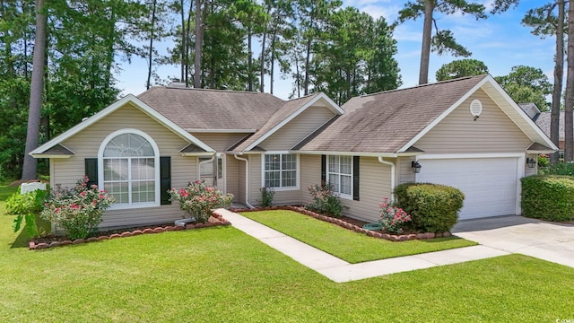 603 Bucks Trl, Longs, SC 29568 - single story home featuring driveway, a garage, a front lawn, and roof with shingles