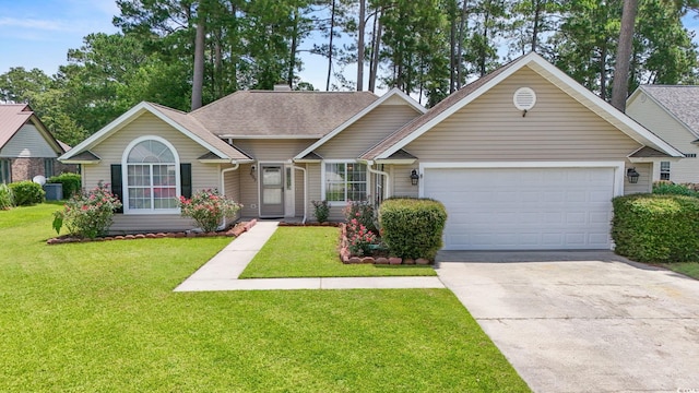 603 Bucks Trl, Longs, SC 29568 - view of front of house featuring concrete driveway, a garage, a front lawn, and roof with shingles