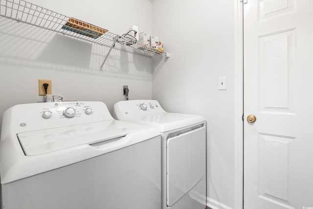 603 Bucks Trl, Longs, SC 29568 - laundry room featuring separate washer and dryer and baseboards