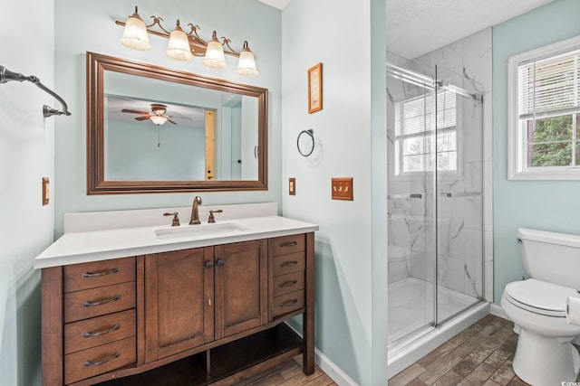 603 Bucks Trl, Longs, SC 29568 - full bathroom with vanity, a marble finish shower, a ceiling fan, and wood finished floors
