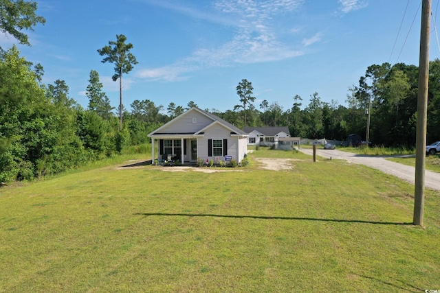 1300 Floyd Page Rd, Galivants Ferry, SC 29544 - view of front of home featuring covered porch and a front lawn