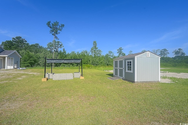 1300 Floyd Page Rd, Galivants Ferry, SC 29544 - view of green lawn featuring a storage shed