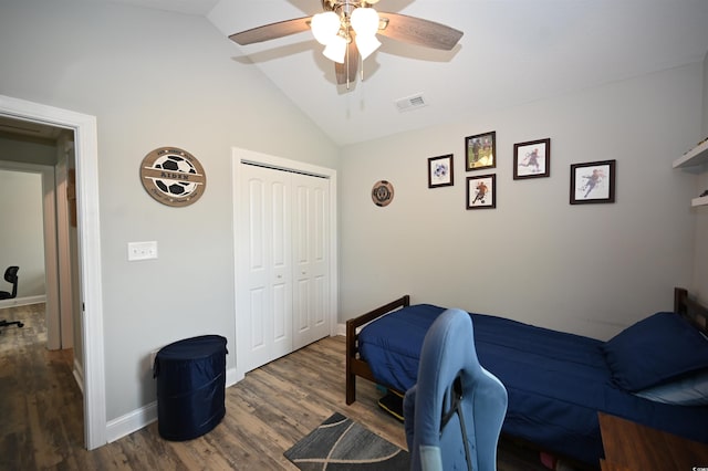 1300 Floyd Page Rd, Galivants Ferry, SC 29544 - bedroom with a closet, wood finished floors, vaulted ceiling, and ceiling fan
