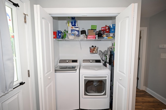1300 Floyd Page Rd, Galivants Ferry, SC 29544 - laundry area featuring washing machine and clothes dryer, wood finished floors, and plenty of natural light
