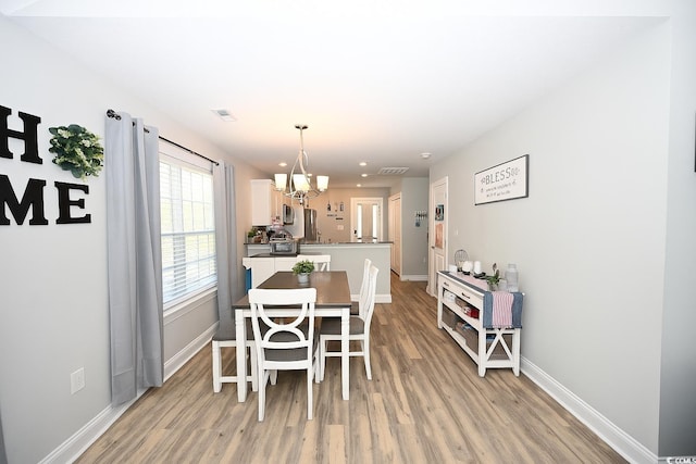 1300 Floyd Page Rd, Galivants Ferry, SC 29544 - dining room with light wood-style floors, a chandelier, and recessed lighting