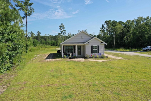 1300 Floyd Page Rd, Galivants Ferry, SC 29544 - view of front of home with dirt driveway and a front lawn