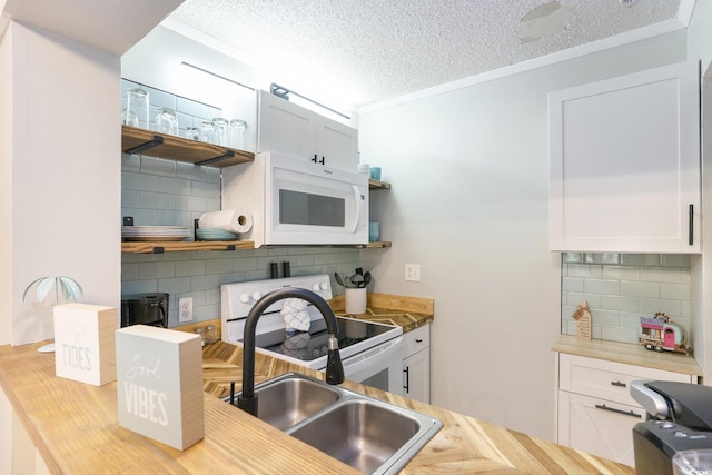 415 Ocean Creek Dr Unit 2208, Myrtle Beach, SC 29572 - kitchen with white appliances, decorative backsplash, open shelves, a textured ceiling, and white cabinetry