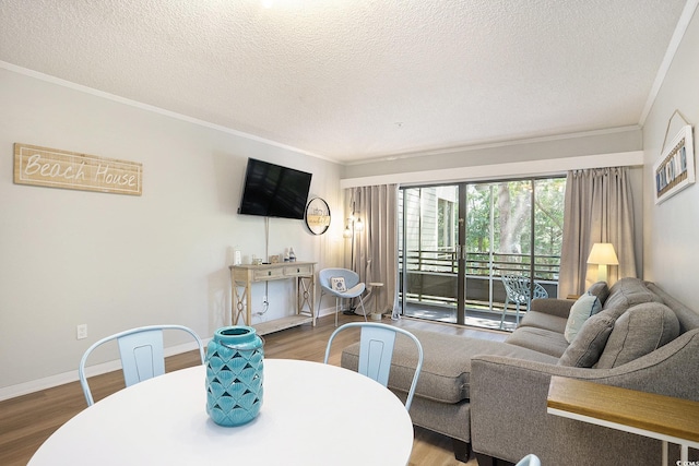 415 Ocean Creek Dr Unit 2208, Myrtle Beach, SC 29572 - living room featuring wood finished floors, crown molding, and a textured ceiling