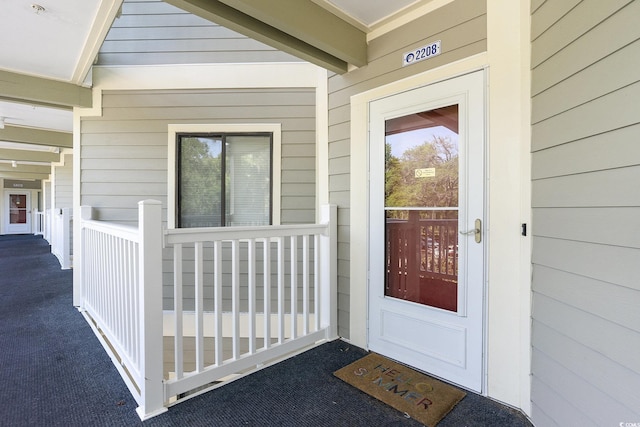 415 Ocean Creek Dr Unit 2208, Myrtle Beach, SC 29572 - view of exterior entry featuring a porch