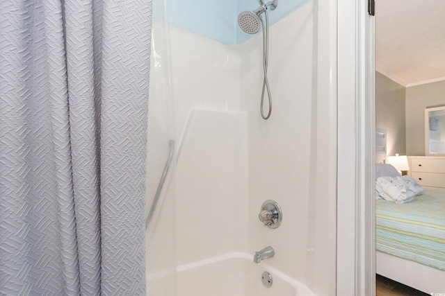 415 Ocean Creek Dr Unit 2208, Myrtle Beach, SC 29572 - ensuite bathroom with shower / bath combo and crown molding