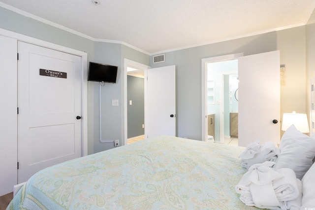 415 Ocean Creek Dr Unit 2208, Myrtle Beach, SC 29572 - bedroom featuring crown molding and ensuite bathroom