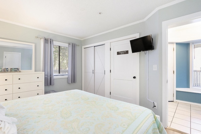 415 Ocean Creek Dr Unit 2208, Myrtle Beach, SC 29572 - bedroom featuring crown molding and tile patterned flooring