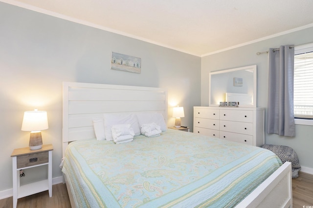415 Ocean Creek Dr Unit 2208, Myrtle Beach, SC 29572 - bedroom featuring wood finished floors and crown molding